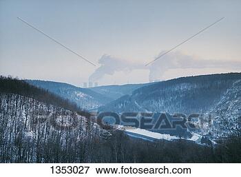 Picture - wooded river valley 
in winter with 
cooling towers 
in the distance. 
fotosearch - search 
stock photos, 
pictures, images, 
and photo clipart