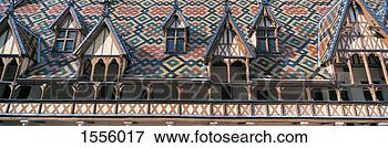 Picture - high section of 
roof pattern at 
the hotel dieu 
in beaune,  burgundy. 
fotosearch - search 
stock photos, 
pictures, images, 
and photo clipart