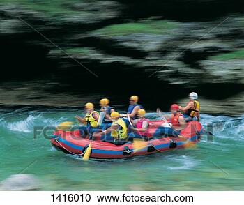 Stock Photography - medium group of 
people paddling 
an inflatable 
raft on the salza 
river. fotosearch 
- search stock 
photos, pictures, 
images, and photo 
clipart