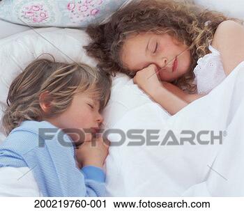 Stock Photography - brother and sister 
(4-6) asleep in 
bed, close-up. 
fotosearch - search 
stock photos, 
pictures, images, 
and photo clipart