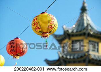 Stock Photography - chinese lanterns 
suspended on wire, 
pagoda in background. 
fotosearch - search 
stock photos, 
pictures, images, 
and photo clipart