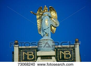 Stock Photography - 'angel ornamentation 
on rooftop in 
amsterdam, holland'. 
fotosearch - search 
stock photos, 
pictures, images, 
and photo clipart
