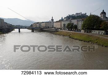 Stock Photo - austria, salzburg, 
river salzach, 
buildings along 
river. fotosearch 
- search stock 
photos, pictures, 
images, and photo 
clipart