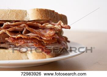 Stock Photo - bacon sandwich, 
close-up. fotosearch 
- search stock 
photos, pictures, 
images, and photo 
clipart