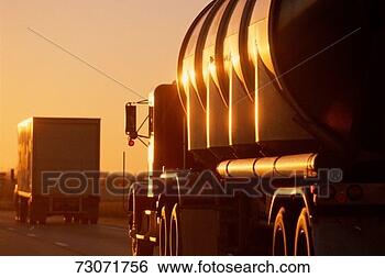 Stock Photo - big rig trucks 
on the highway. 
fotosearch - search 
stock photos, 
pictures, images, 
and photo clipart