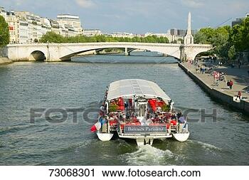 Stock Photography - 'boat on the seine 
river, paris, 
france'. fotosearch 
- search stock 
photos, pictures, 
images, and photo 
clipart