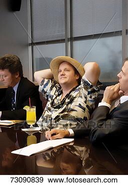 Stock Photograph - businessman daydreaming 
in boardroom meeting. 
fotosearch - search 
stock photos, 
pictures, images, 
and photo clipart