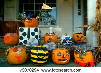 Stock Photo - 'carved pumpkins 
on porch, basking 
ridge, new jersey'. 
fotosearch - search 
stock photos, 
pictures, images, 
and photo clipart