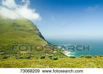 Stock Photograph - 'cloud comes in 
at cape point, 
 cape of good 
hope,  outside 
cape. fotosearch 
- search stock 
photos, pictures, 
images, and photo 
clipart