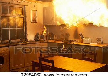 Stock Photo - fire raging in 
domestic kitchen 
at night. fotosearch 
- search stock 
photos, pictures, 
images, and photo 
clipart