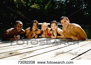 Stock Photo - five young people 
in swimwear, portrait. 
fotosearch - search 
stock photos, 
pictures, images, 
and photo clipart