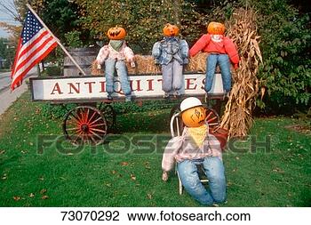 Stock Photo - 'halloween pumpkin 
characters sitting 
on wagon and lawn, 
new england'. 
fotosearch - search 
stock photos, 
pictures, images, 
and photo clipart