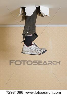 Stock Photo - human leg dangling 
from hole in ceiling. 
fotosearch - search 
stock photos, 
pictures, images, 
and photo clipart