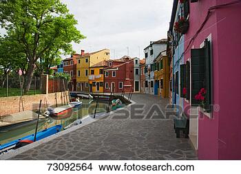 Stock Photo - italy, venice, 
burano, colourful 
houses beside 
canal. fotosearch 
- search stock 
photos, pictures, 
images, and photo 
clipart