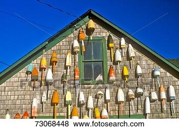 Stock Photo - lobster buoys 
on side of building 
in muscongus bay 
in new harbor 
me. fotosearch 
- search stock 
photos, pictures, 
images, and photo 
clipart
