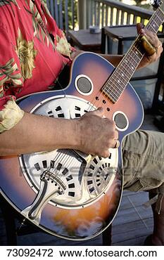 Stock Photo - man playing guitar, 
mid section. fotosearch 
- search stock 
photos, pictures, 
images, and photo 
clipart