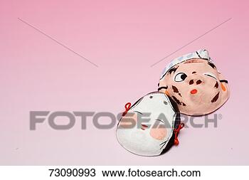 Stock Photo - masks of okame 
and hyottoko. 
fotosearch - search 
stock photos, 
pictures, images, 
and photo clipart