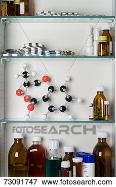 Picture - medicine cabinet 
with molecular 
model of aspirin. 
fotosearch - search 
stock photos, 
pictures, images, 
and photo clipart
