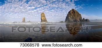 Stock Photo - 'needles and haystack 
rock formations 
at cannon beach, 
oregon'. fotosearch 
- search stock 
photos, pictures, 
images, and photo 
clipart