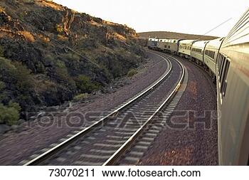 Stock Photography - passenger train 
traveling into 
the arizona sunset. 
fotosearch - search 
stock photos, 
pictures, images, 
and photo clipart