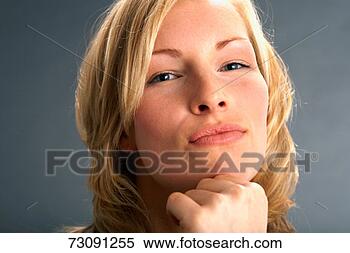 Stock Image - portrait of woman 
in studio, close-up, 
portrait. fotosearch 
- search stock 
photos, pictures, 
images, and photo 
clipart