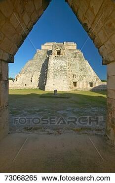 Stock Image - 'pyramid of the 
magician through 
archway door, 
 a mayan ruin 
in the. fotosearch 
- search stock 
photos, pictures, 
images, and photo 
clipart