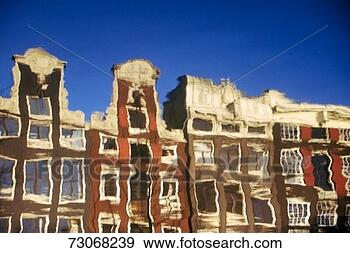 Stock Photograph - 'reflections of 
buildings in a 
canal in amsterdam, 
holland'. fotosearch 
- search stock 
photos, pictures, 
images, and photo 
clipart