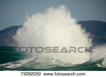 Stock Photography - sea breaking into 
spectacular spray. 
fotosearch - search 
stock photos, 
pictures, images, 
and photo clipart