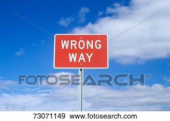 Stock Photograph - a sign that reads 
 wrong way . fotosearch 
- search stock 
photos, pictures, 
images, and photo 
clipart