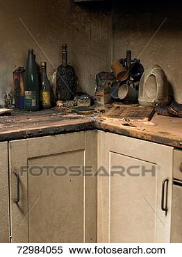 Stock Image - smoke stained 
objects in corner 
of kitchen after 
fire. fotosearch 
- search stock 
photos, pictures, 
images, and photo 
clipart