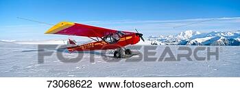 Stock Photo - 'super cub piper 
bush airplane, 
 wrangell-st elias 
national park. 
fotosearch - search 
stock photos, 
pictures, images, 
and photo clipart