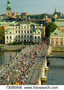 Stock Photo - sweden,  stockholm, 
 marathon race 
on vasabron bridge 
near old town. 
fotosearch - search 
stock photos, 
pictures, images, 
and photo clipart