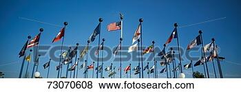Stock Photo - 'there are 50 
state flags waving 
in the wind on 
flagpoles equal. 
fotosearch - search 
stock photos, 
pictures, images, 
and photo clipart