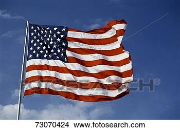 Stock Photo - 'this is an american 
flag,  waving 
in the wind it 
is on a flagpole. 
fotosearch - search 
stock photos, 
pictures, images, 
and photo clipart