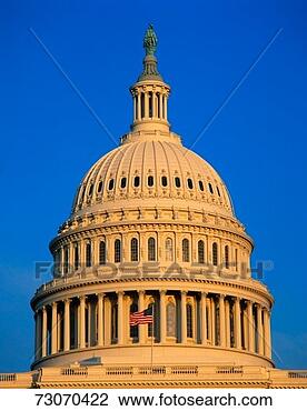 Stock Photo - this is the dome 
of the us capitol 
against a blue 
sky there is an. 
fotosearch - search 
stock photos, 
pictures, images, 
and photo clipart