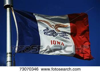 Stock Photo - 'this is the iowa 
state flag,  waving 
in the wind it 
is on a flagpole. 
fotosearch - search 
stock photos, 
pictures, images, 
and photo clipart