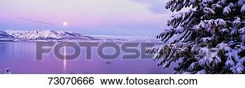 Stock Photo - this is lake tahoe 
after a winter 
snow storm there 
is a full moon. 
fotosearch - search 
stock photos, 
pictures, images, 
and photo clipart