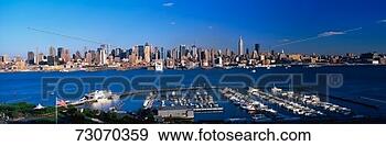 Stock Photograph - 'this is the midtown 
manhattan skyline 
and the east river 
at sunset. fotosearch 
- search stock 
photos, pictures, 
images, and photo 
clipart