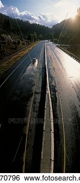 Stock Photo - this is route 
90 showing the 
wet road in the 
rain there is 
autumn. fotosearch 
- search stock 
photos, pictures, 
images, and photo 
clipart