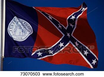 Stock Photo - this is the state 
flag waving in 
the wind it is 
set on a flagpole 
and. fotosearch 
- search stock 
photos, pictures, 
images, and photo 
clipart