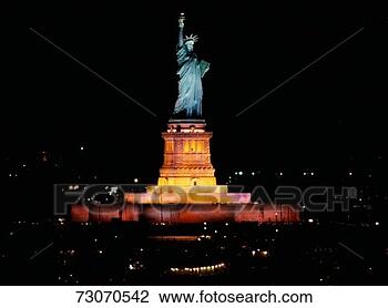 Stock Photo - this is the statue 
of liberty lit 
up at night on 
liberty weekend 
it. fotosearch 
- search stock 
photos, pictures, 
images, and photo 
clipart