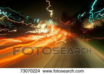 Stock Photo - time exposure 
of highway lights 
at night. fotosearch 
- search stock 
photos, pictures, 
images, and photo 
clipart