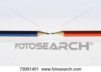 Stock Photography - tip of blue pencil 
touching red pencil, 
studio shot. fotosearch 
- search stock 
photos, pictures, 
images, and photo 
clipart