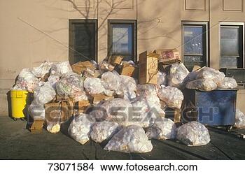 Stock Photo - trash pile against 
a building in 
new york city. 
fotosearch - search 
stock photos, 
pictures, images, 
and photo clipart