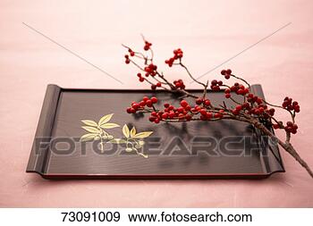 Stock Photograph - twig of mountain 
ash and wooden 
tray. fotosearch 
- search stock 
photos, pictures, 
images, and photo 
clipart