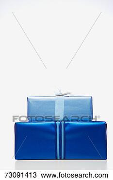 Stock Photo - two blue gifts, 
studio shot. fotosearch 
- search stock 
photos, pictures, 
images, and photo 
clipart