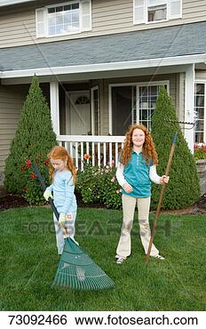 Stock Photo - two girls (7-10) 
gardening. fotosearch 
- search stock 
photos, pictures, 
images, and photo 
clipart