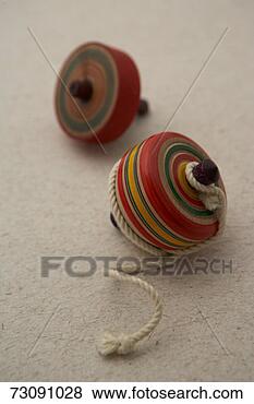 Stock Photo - two koma tops. 
fotosearch - search 
stock photos, 
pictures, images, 
and photo clipart