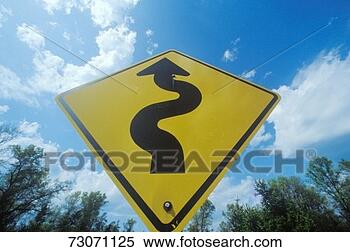 Stock Image - windy road sign. 
fotosearch - search 
stock photos, 
pictures, images, 
and photo clipart