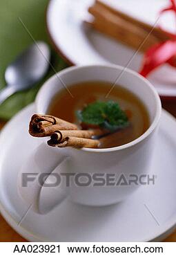 Stock Photography - cinnamon in a 
cup of hot cider. 
fotosearch - search 
stock photos, 
pictures, images, 
and photo clipart